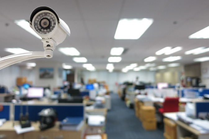 A security camera placed inside a workplace