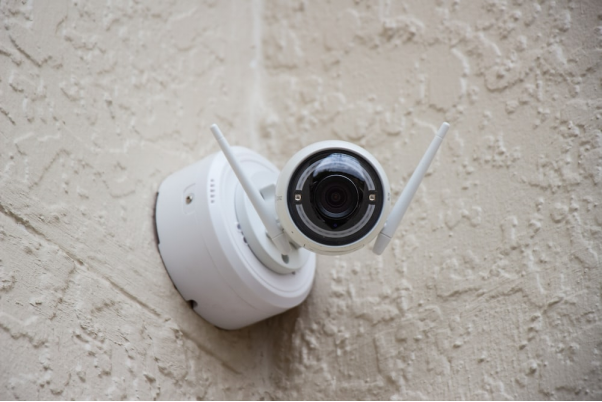 Security camera mounted on the wall. 